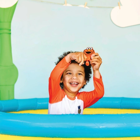 Glo Pals, Postać do kąpieli Elmo - zestaw z dwiema kostkami sensorycznymi świecącymi w wodzie